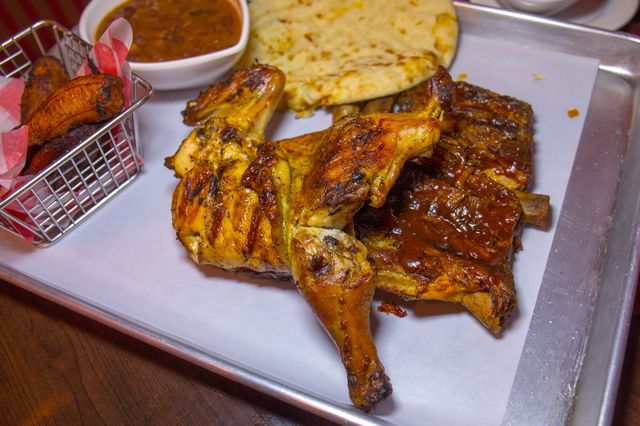 Grilled Half Chicken, Grilled Half Rack of Ribs, with Red Beans and Maduros ($23)<br/>